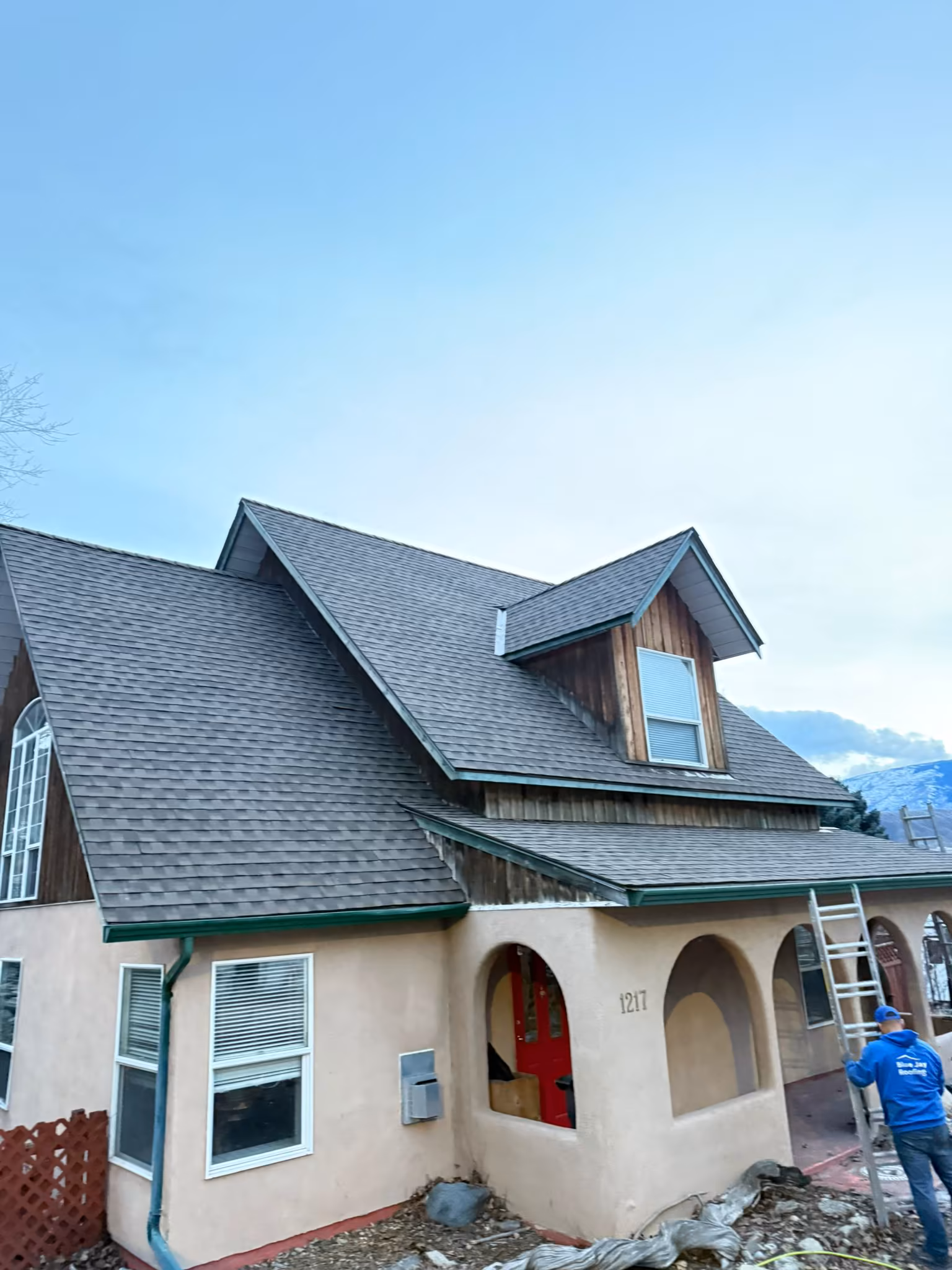 Architectural shingle roof replacement with ridge vent installation in West Kelowna.